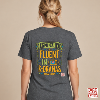 Woman wearing a gray tee with “Emotionally Fluent in K-Dramas” printed on back, Korean show superfan identity binge watching t-shirt by K-Jota