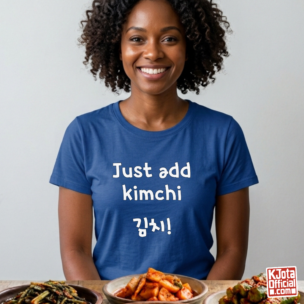 woman wearing a blue t-shirt with “Just add kimchi” printed on front by K-Jota