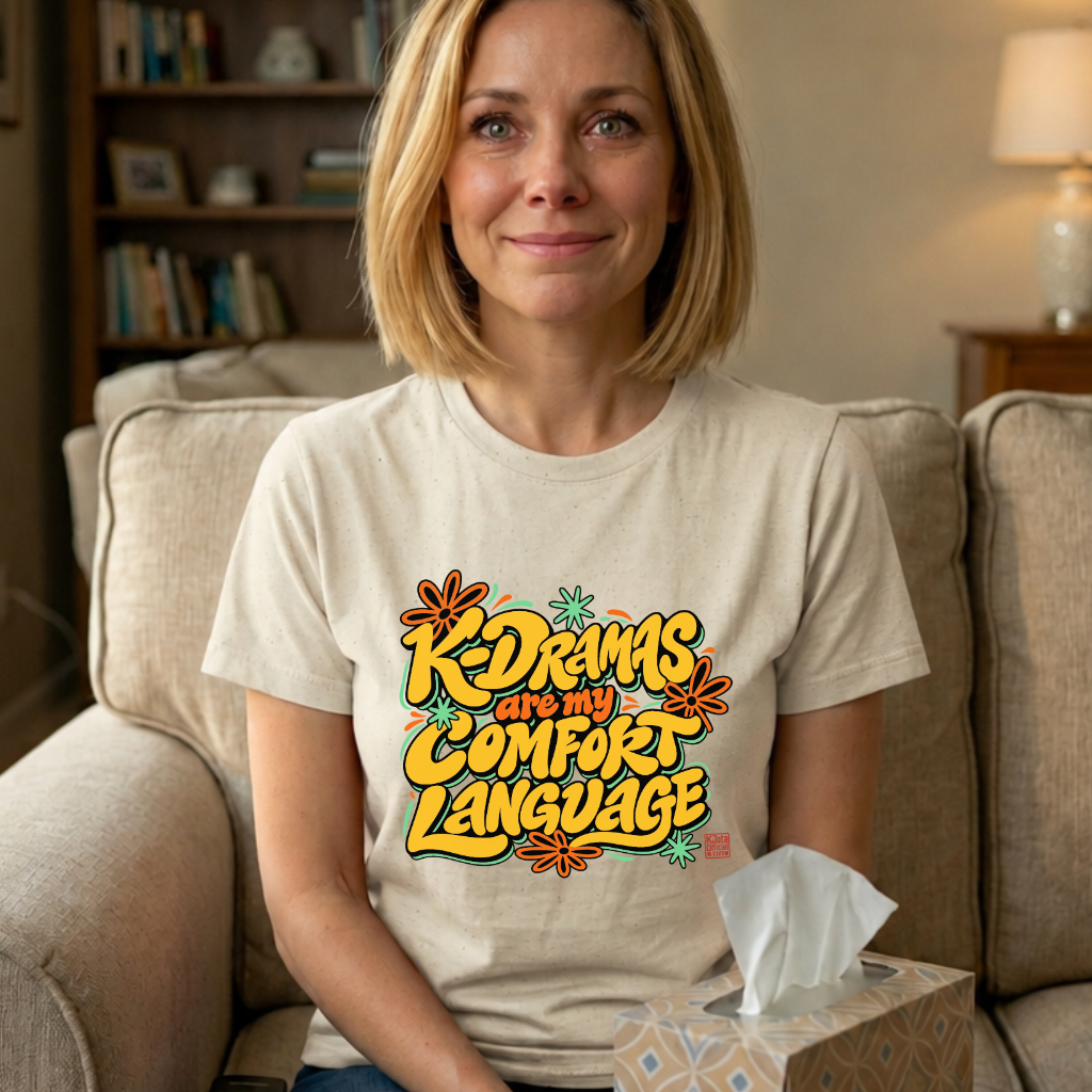 woman wearing a beige t-shirt with “K-Dramas Are My Comfort Language” printed on front by K-Jota
